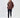 Model wearing a brown NY graphic sweatshirt and black skinny jeans in a streetwear style studio shot.