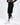 A model wearing black jogger pants paired with white sneakers and elastic cuffs.