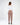 Back view of the Adriana Off-Shoulder Crop Top in Carbon white with long sleeves and cut-out detail.