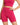 A model wearing a fitted pink crop top and matching high-waisted shorts, showcasing a casual style.