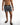 Men's Niko black and white vertical striped swim trunks with drawstring and elastic waistband by Carbon.