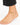 A delicate gold anklet with colorful beads, worn on a bare foot against a white background.