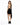 A woman in a black dress with a backless design and a flowing tie, paired with stylish black heeled boots.