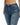Close-up of a person wearing distressed blue denim jeans with a high waist and a button closure.