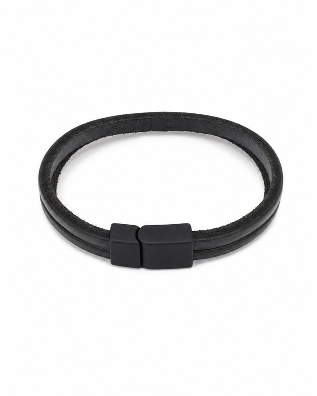 Black bracelet featuring a sleek magnetic clasp for easy wear and a minimalist design.