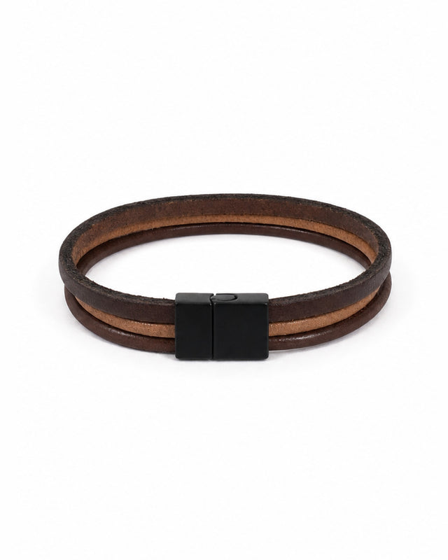 Brown bracelet featuring a sleek black clasp and layered design for a modern look.