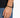 A close-up of a hand wearing a black beaded bracelet, showcasing a simple and modern design.
