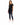 A woman stands wearing a black short-sleeve top with a heart design, paired with distressed skinny jeans and white sn...