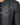 Close-up of a black jacket featuring a zippered pocket and ribbed shoulder detailing.