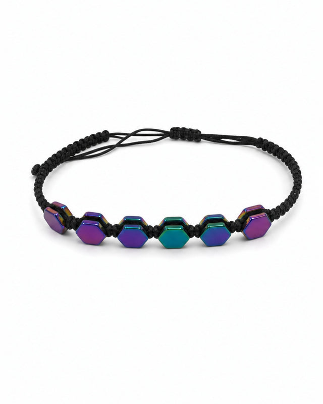 Colorful beads are threaded on a black braided cord, creating a stylish bracelet design.