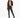 A model poses in a cropped black blazer over a yellow bikini, paired with fitted black pants featuring slits.
