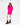 Model in vibrant hot pink Brooke Sweater featuring an oversized knit fit arm cut-outs with black combat boots.