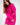 Model wearing the Brooke hot pink oversized knit sweater with elbow cut-outs and a mock neckline.