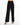 Wide-leg black pants with a high waist, featuring front pleats and a button closure, styled with strappy heels.