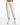 Light-colored cropped pants with a brown braided belt, paired with white sneakers.