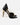 Rock black pointed toe heels with metallic gold stiletto, rhinestone embellishments, and ankle straps on white background.