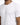 Close-up of a man wearing a plain white crew neck t-shirt and fabric texture.