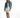 Model in oversized Jolie blue washed denim jacket with distressing, frayed hems, and silver buttons over a white dress.