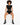 A model poses in black shorts and a matching cropped top, showcasing stylish chain details sneakers.