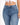 Close-up of a person wearing high-waisted blue jeans paired with a white cropped top, showcasing a casual style.
