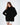 Celine black turtleneck sweater distressed fringe hem on a female model.
