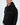 A young man wearing a black hoodie with a front pocket and subtle graphic detailing on the hood.