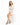 A model poses in a white cut-out dress with long sleeves and black strappy heels, showcasing a stylish look.