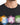 Black t-shirt featuring colorful graphic designs of symbols and the phrase about kindness.