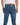 Close-up of a person wearing blue jeans, showcasing the back view with two pockets and a leather label.
