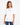 A woman wearing a white oversized tee with short sleeves and a black text graphic, paired with blue jeans.