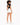 A model with curly hair wears a black cropped top with a back cutout, paired with white shorts and sneakers.