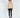 Lilith beige ribbed knit sweater with shoulder cut-outs and black side stripes, paired with black skinny jeans.