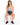 A model sits on a white cube wearing denim shorts and a tie-dye tank top, paired with black sneakers.