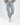 Model wearing Lily Jacket Set light grey joggers with drawstring waist, elastic cuffs, and matching cropped zip jacket.