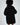 Back view of a model wearing a black oversized streetwear hoodie, part of the Lips Top collection for women.