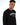 Model wearing a Carbon Superior Intelligence black long-sleeve graphic shirt in a minimalist streetwear style.