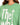 A close-up of a woman wearing a green sweatshirt featuring bold, distressed white lettering and a crew neckline.