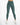 Form-fitting, high-waisted leggings in a deep green shade, paired with white athletic shoes.