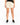 Cream drawstring sweat shorts from the waist down with black sneakers