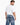 A man with short hair wearing a loose-fitting white t-shirt and light blue jeans, viewed from the back.