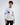 A model wearing a long-sleeve white shirt with colorful graphics and playful text designs.
