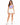 A model poses in a light purple crop top and white high-waisted shorts, paired with white sneakers.