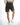 Back view of Maxine high-waisted grey washed denim shorts with classic pockets on a model wearing white sneakers.