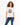 Model wearing white Carbon More Love Graphic T-Shirt with photo print, paired with blue jeans for a streetwear look.