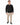 A man stands wearing a textured black sweatshirt, beige pants, and black sneakers against a white background.