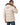 A man wearing a beige puffer coat with a faux fur hood, looking back while standing against a white background.