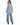Saylor Sweater in Light Blue – back view, ribbed and cable knit, worn with wide-leg jeans
