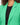Ride Blazer in Green – close-up of the notched lapels and covered single button over a black top