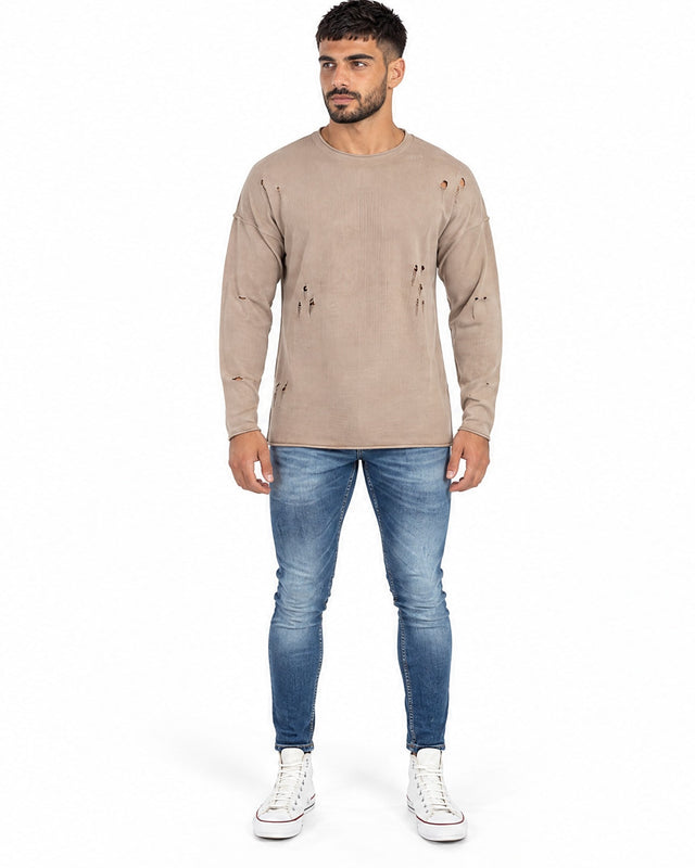 Sean Knit Sweater in Beige – full-length front view with distressed holes, worn with blue jeans