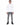 Romeo Turtleneck Sweater in White – full-length front view on model with gray ripped-knee jeans